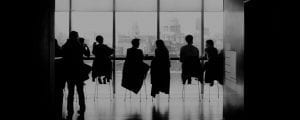 People around the table talk to each other